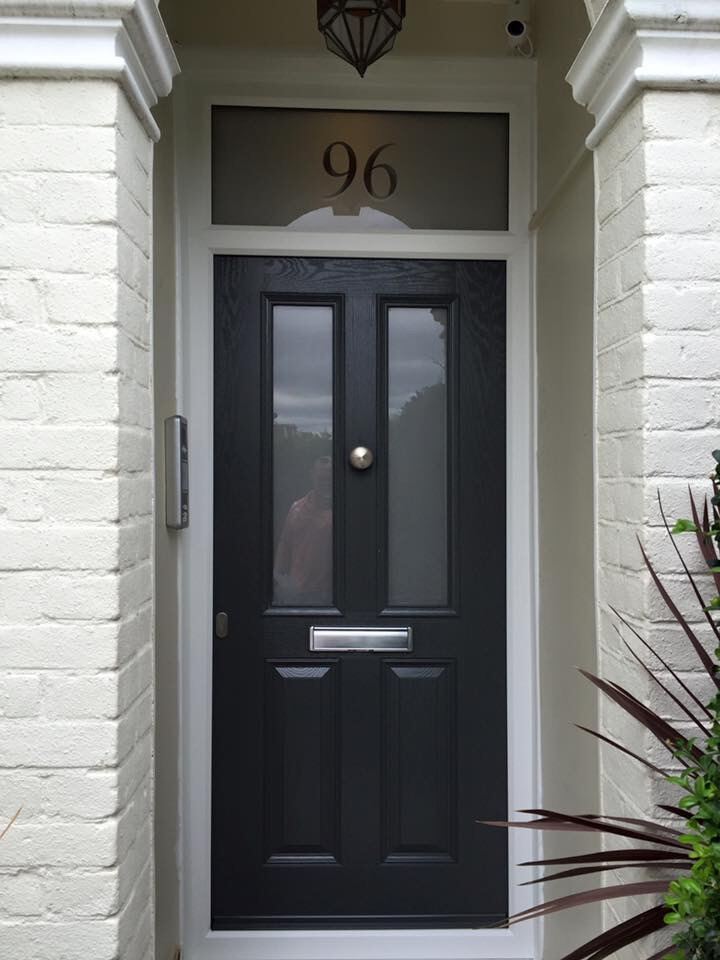 Black composite front door with diamond leaded glazing
